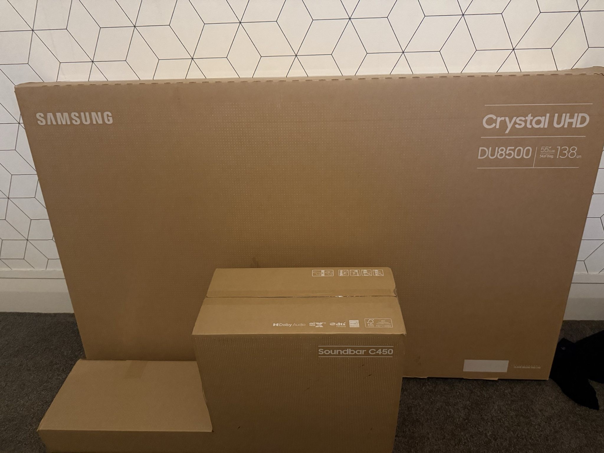 Boxed 55  samsung crystal UHD DU8500 and Soundbar C450
