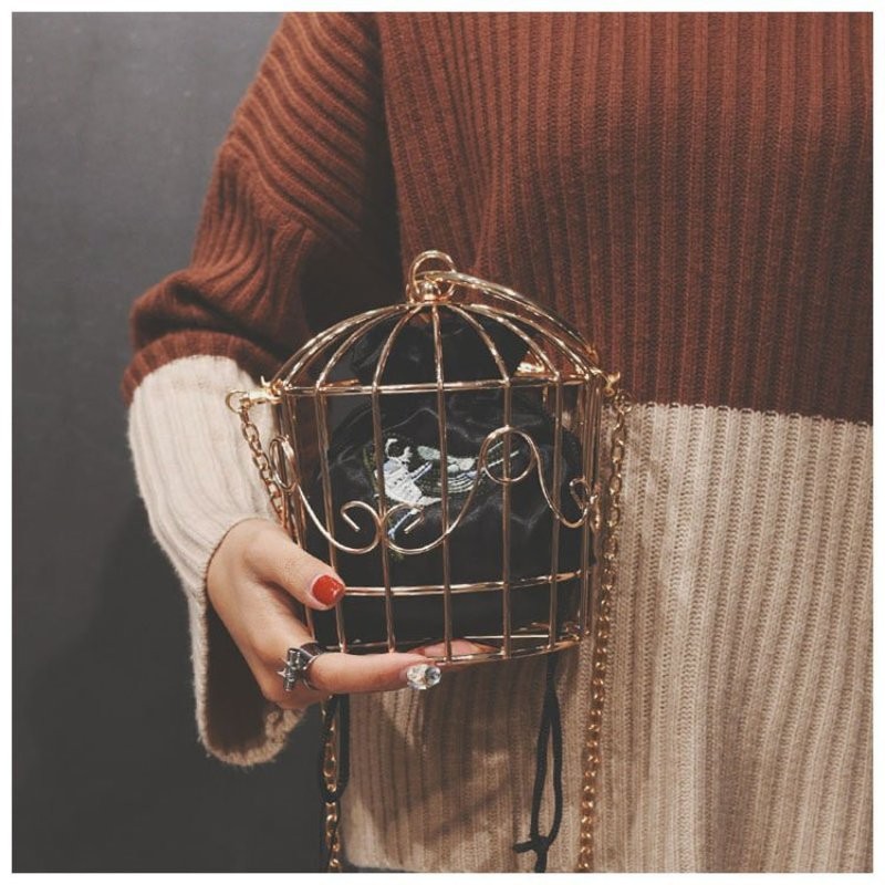 decorating a birdcage with lights