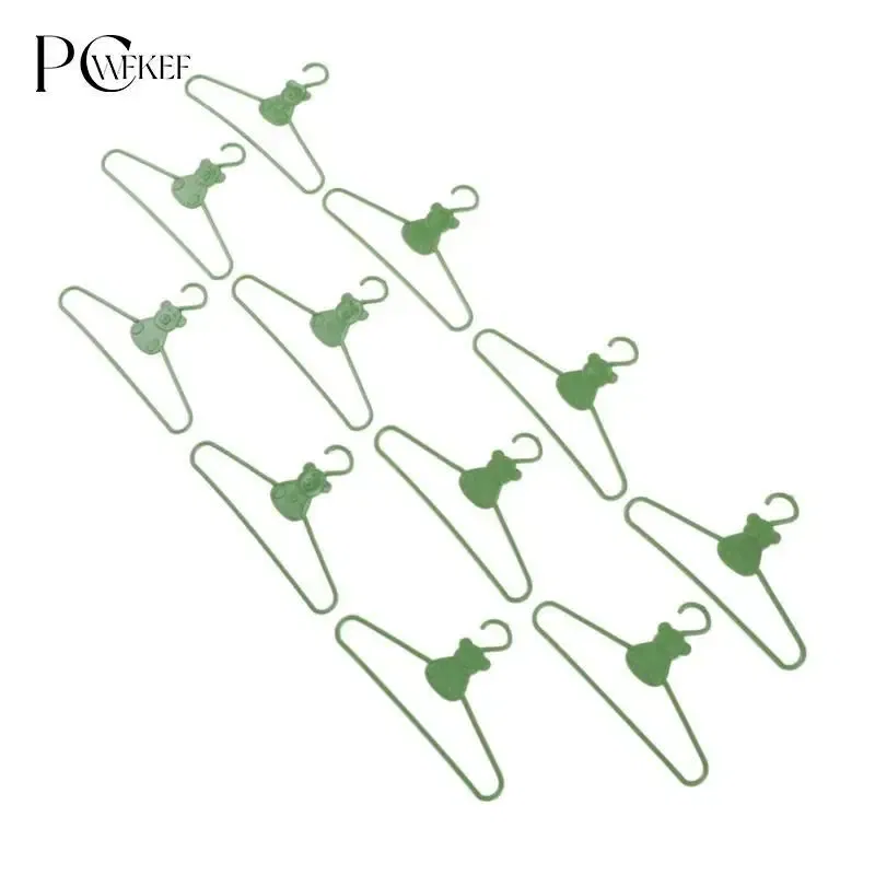 Color: light green - 10/20 PCS / Lot Lovely Green Hangers Mini Cute Wardrobe Dress Coat Clothes Plastic Accessories For Babi Doll Dollhouse Gift Toy