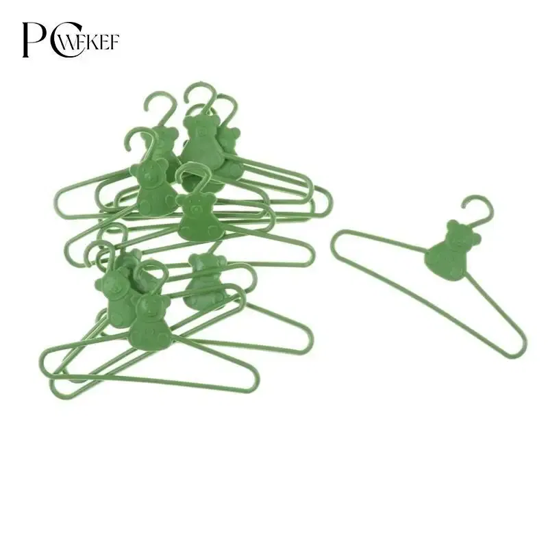 Color: light green - 10/20 PCS / Lot Lovely Green Hangers Mini Cute Wardrobe Dress Coat Clothes Plastic Accessories For Babi Doll Dollhouse Gift Toy