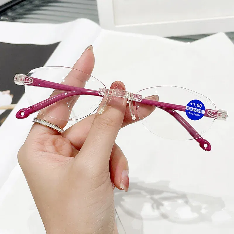 Eye Prescription: +150, Frame Color: Red - New Blue Light Blocking Scratch Resistant Bifocal Reading Glasses for Both Men Women Universal Frameless Design Power 0 To +4.0