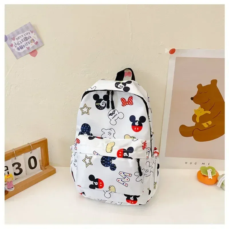 Color: Pink - MINISO Disney 2025 New Cute Cartoon Mickey & Minnie Portable Large Capacity Student Backpack Teenage Casual Fashion Schoolbag