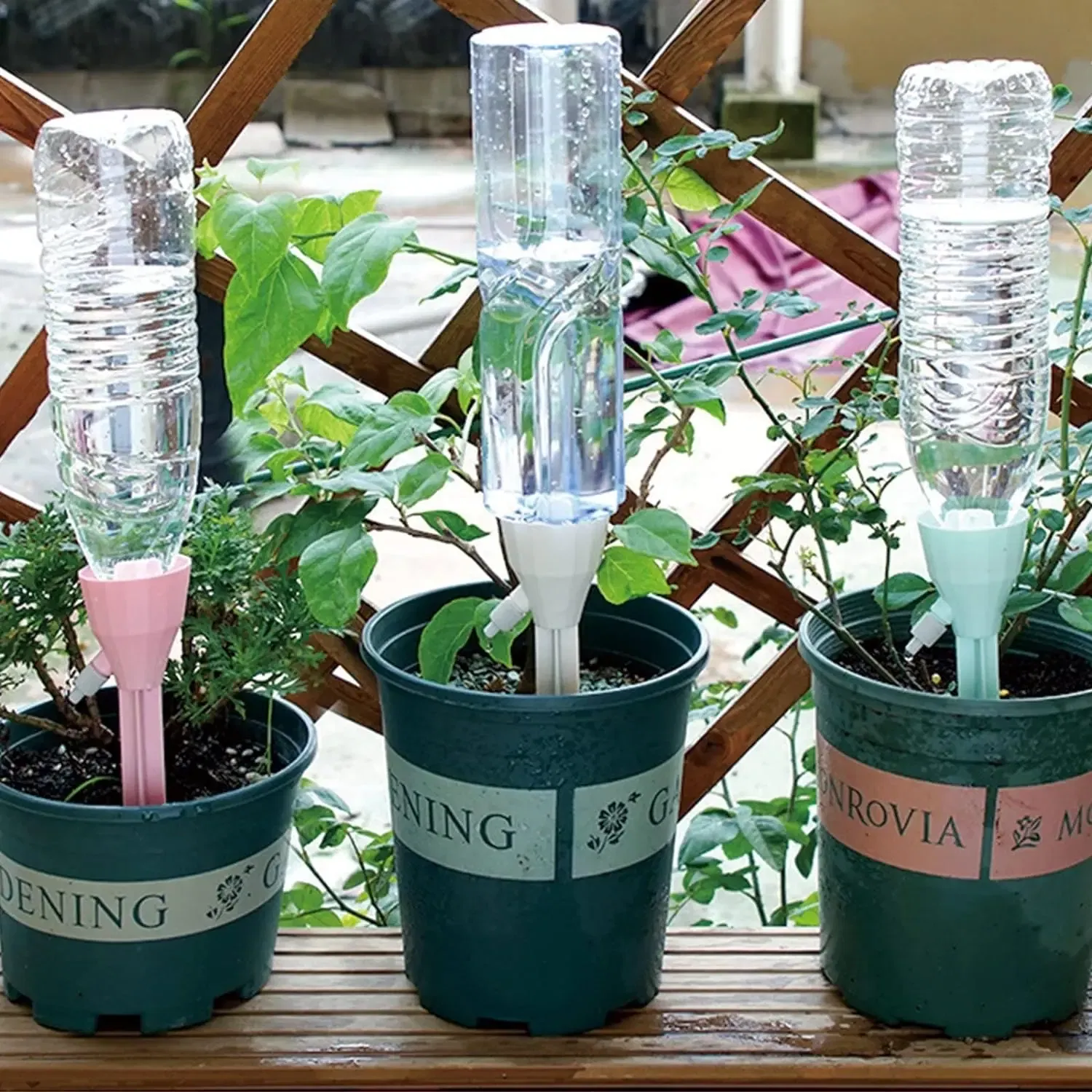 Color: Yellow - Drip Waterer Watering Device Household Timer Waterer Drip Irrigation Travel Water Seepage Sprinkler Automatic Watering Home