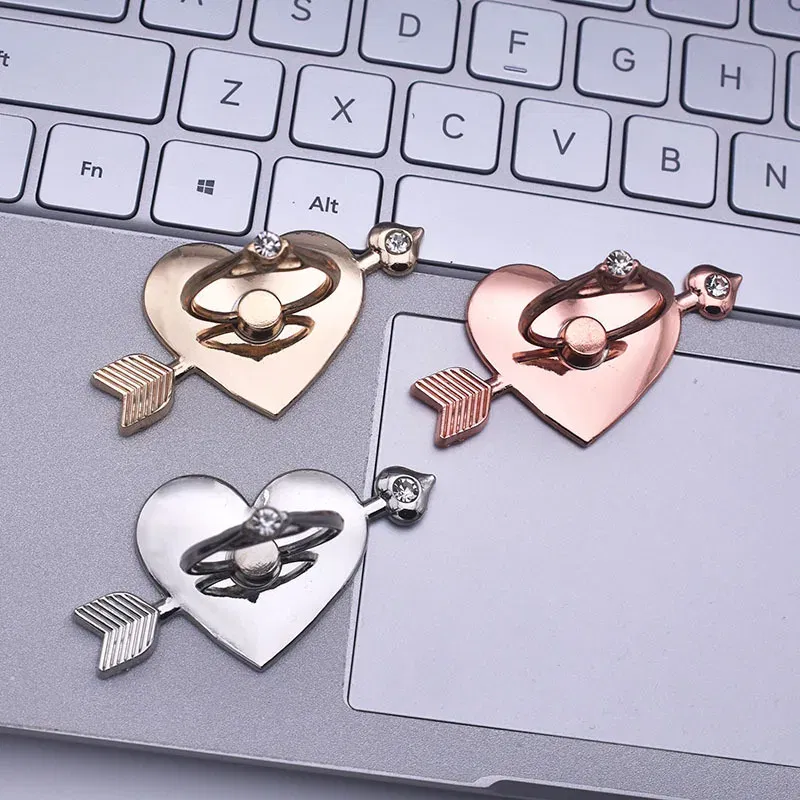 Color: black - Mental Mobile Phone Ring Buckle Bracket Full Metal 360 Back Sticker One Arrow Through The Heart Love Phone Stand accessories