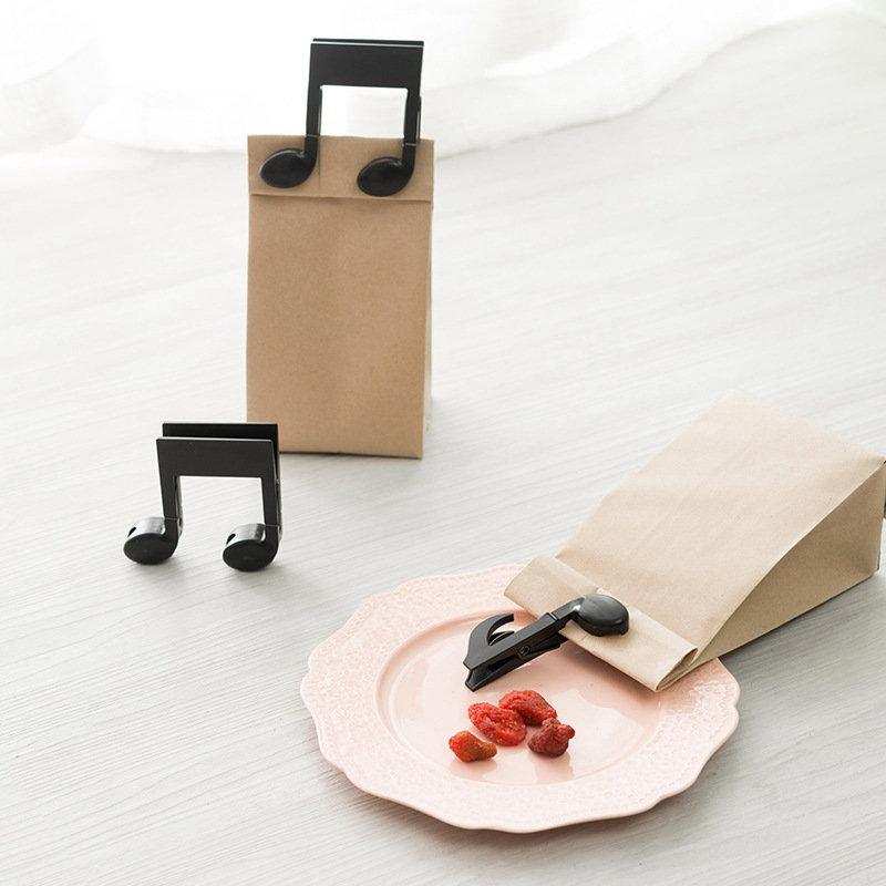 Note shaping clamp