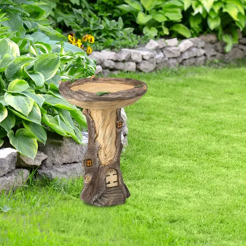 Decorative Bird Feeder In The Courtyard Of An Outdoor Farmhouse Garden