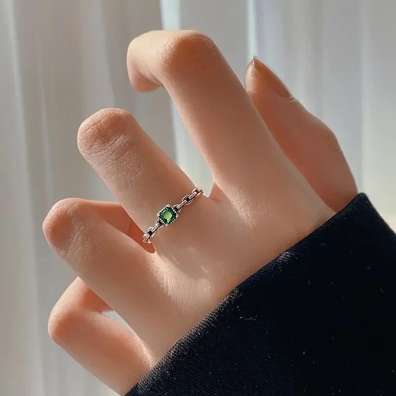 Elegant 925 Sterling Silver Ring with Emerald Green Cubic Zirconia - Minimalist Intertwined Design, Perfect for Daily Wear & Special Occasions
