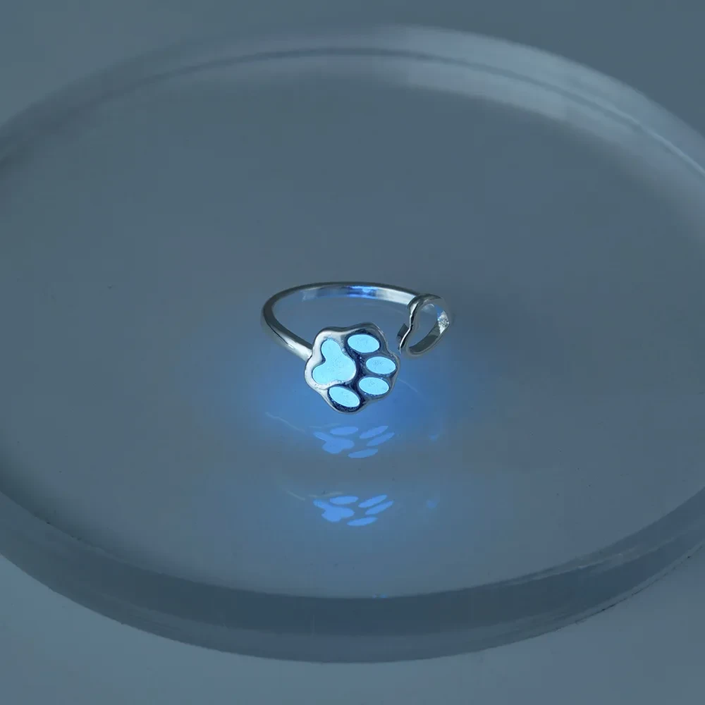 Glow-in-the-dark adjustable ring with dog paws